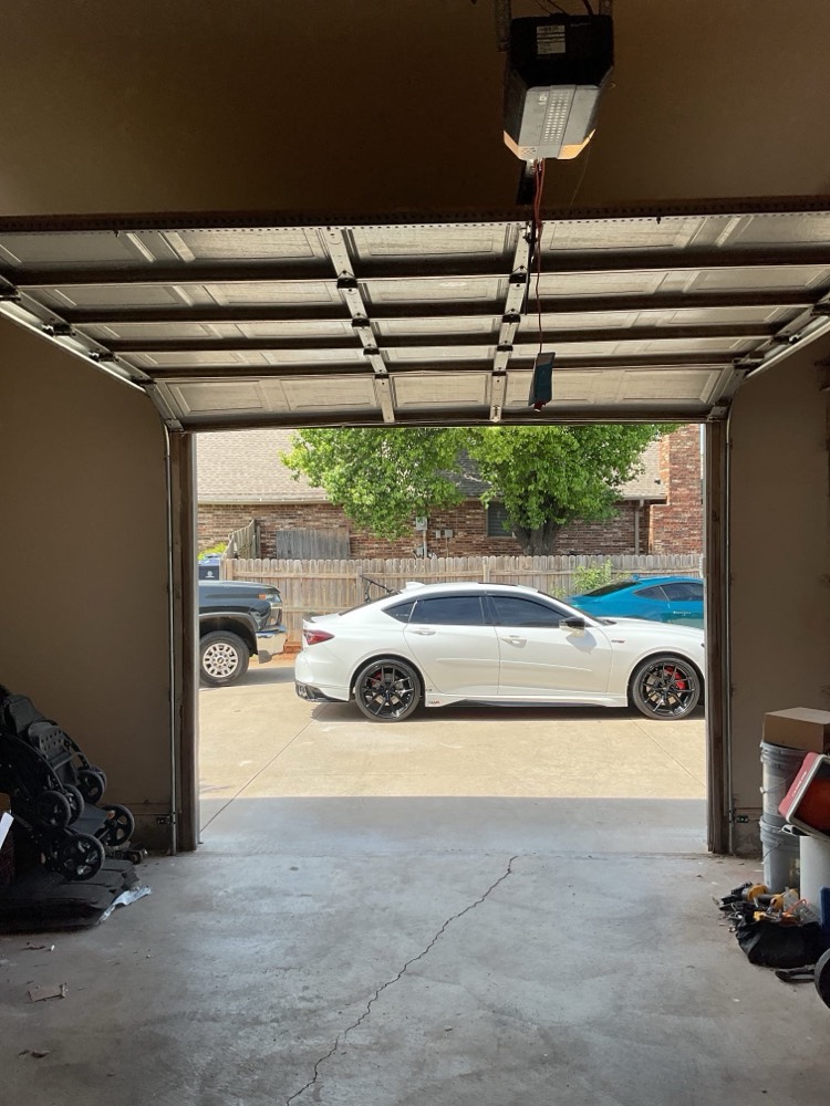 Installed dual garage doors with new opener system