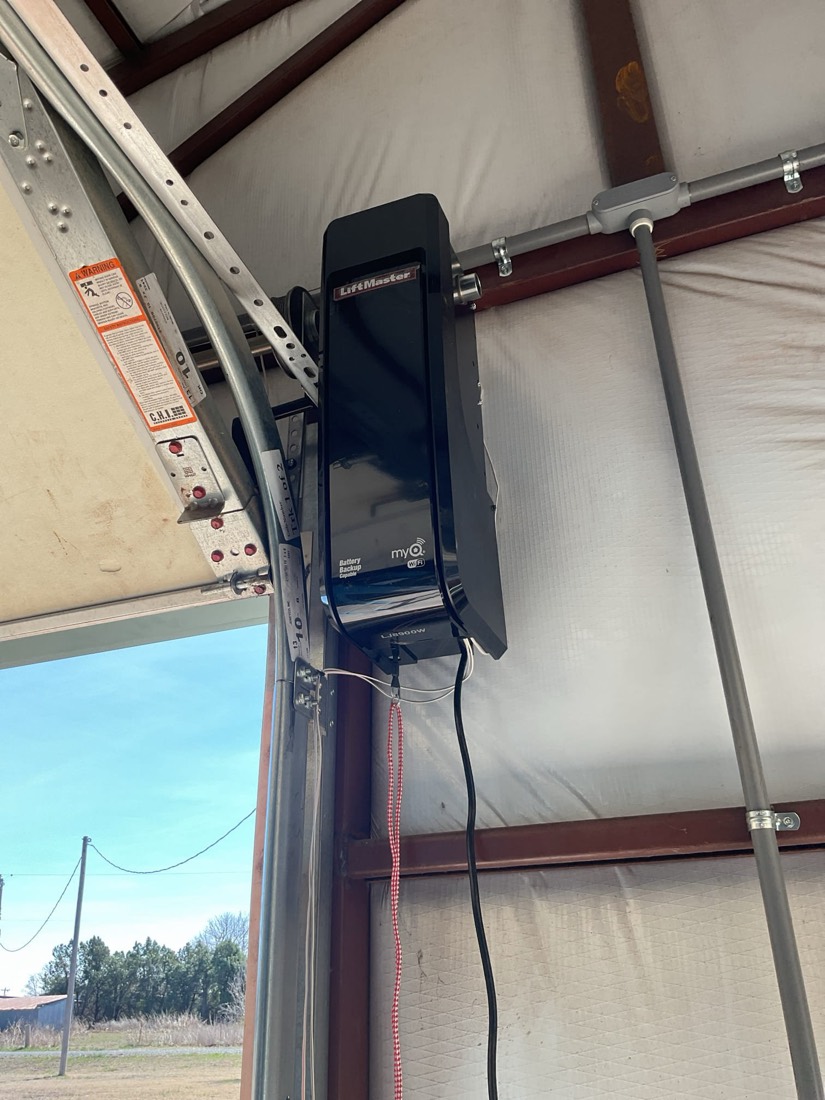 LiftMaster opener with wiring and hardware installation