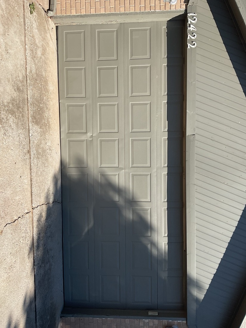 Two-tone gray garage door installation in Oklahoma City