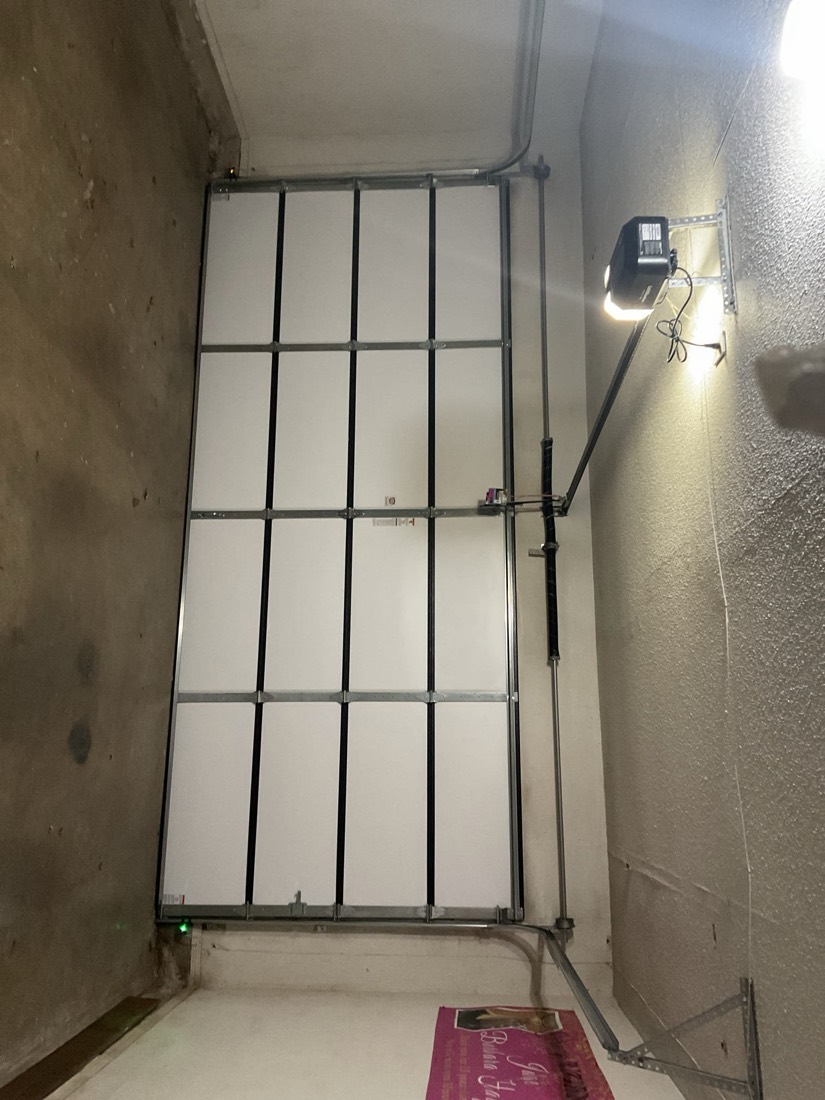 Garage door frame and hardware during installation.
