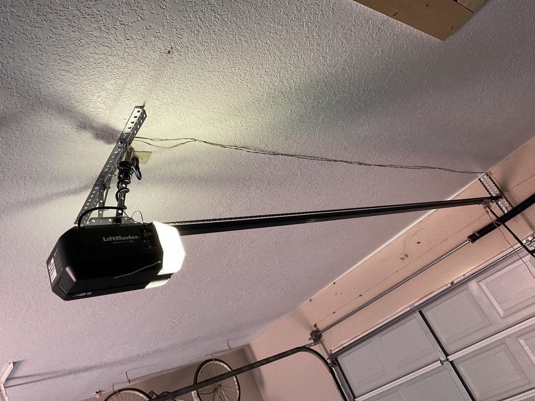 LiftMaster garage door opener motor mounted on garage wall