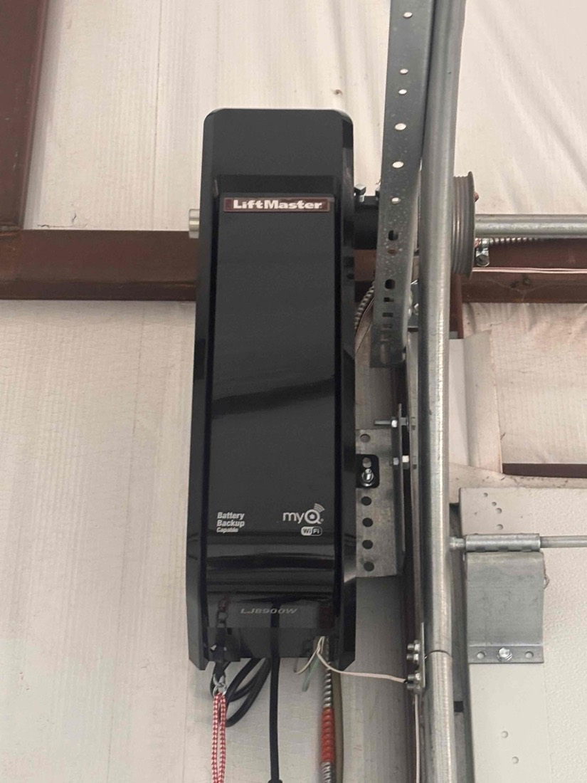 LiftMaster opener unit installed on garage door jamb