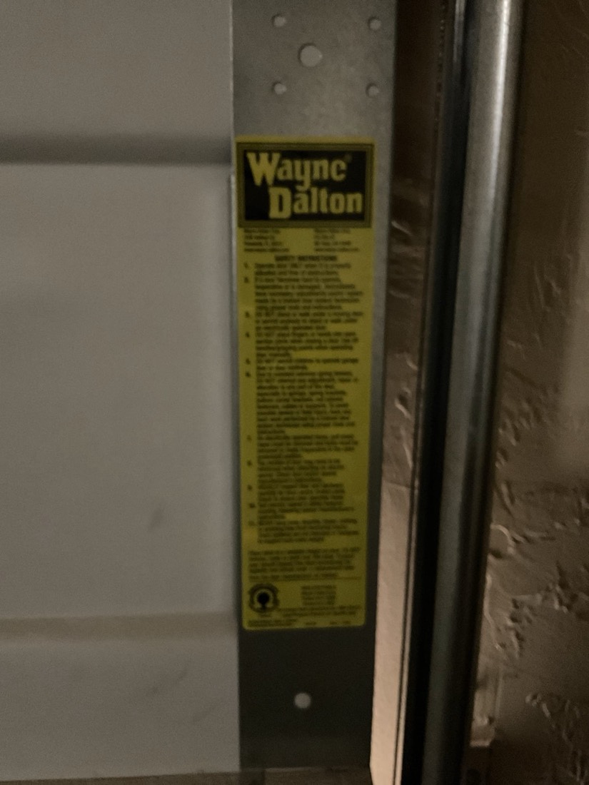 Wayne Dalton garage door spring label and hardware assembly.