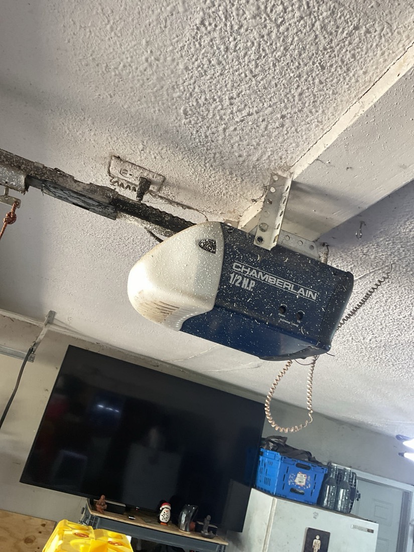 Chamberlain garage door opener with cable and bracket assembly