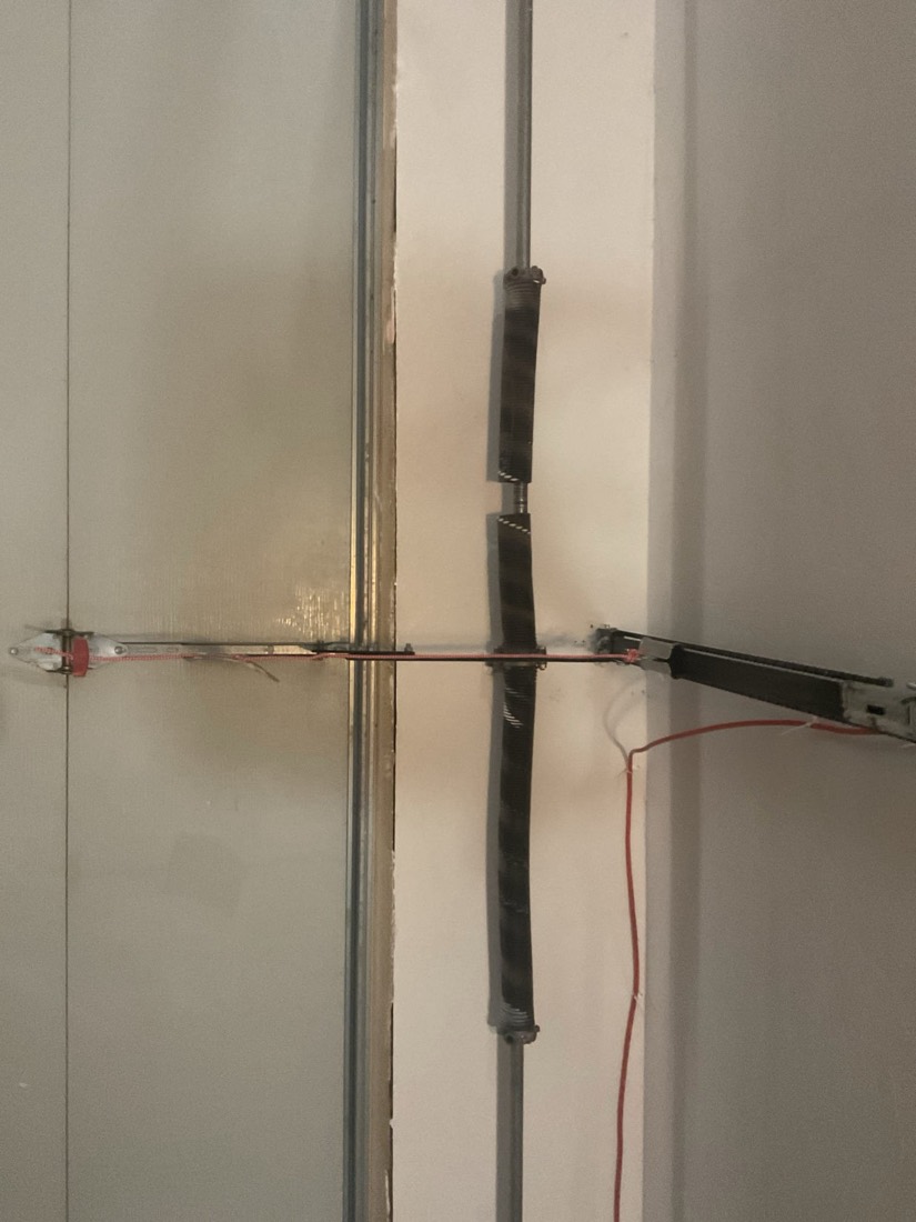 Installed torsion spring on garage door