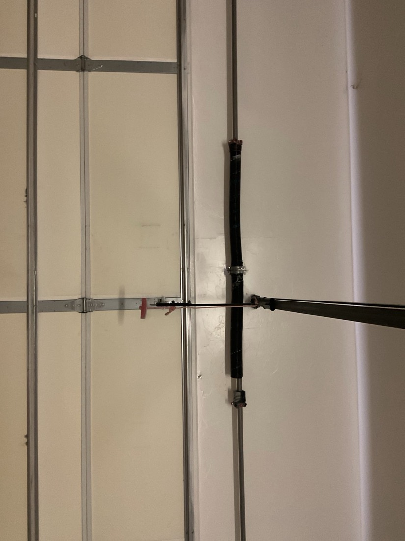 Replaced garage door torsion spring and hardware on residential door.
